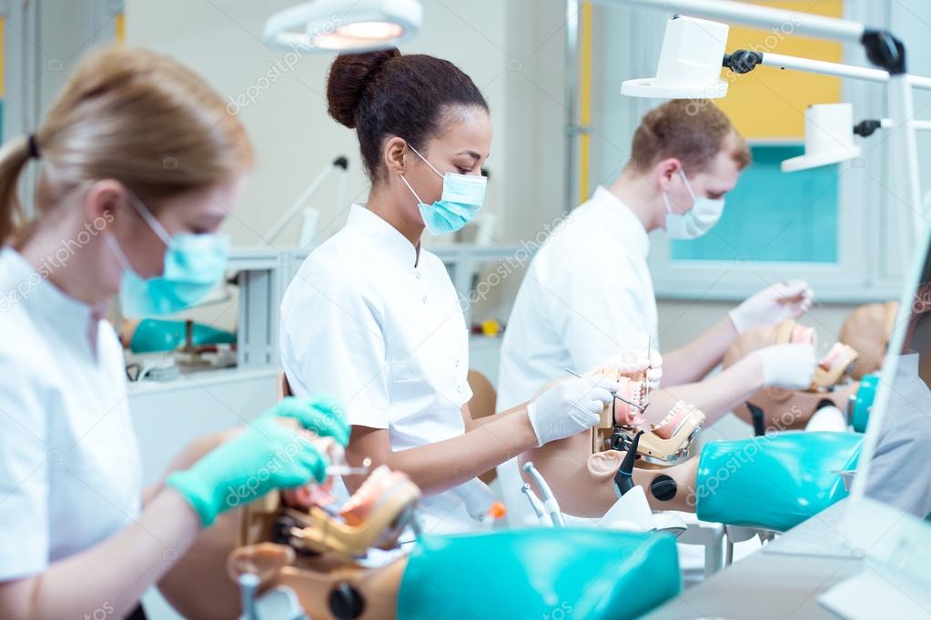 depositphotos_127677236-stock-photo-students-of-stomatology